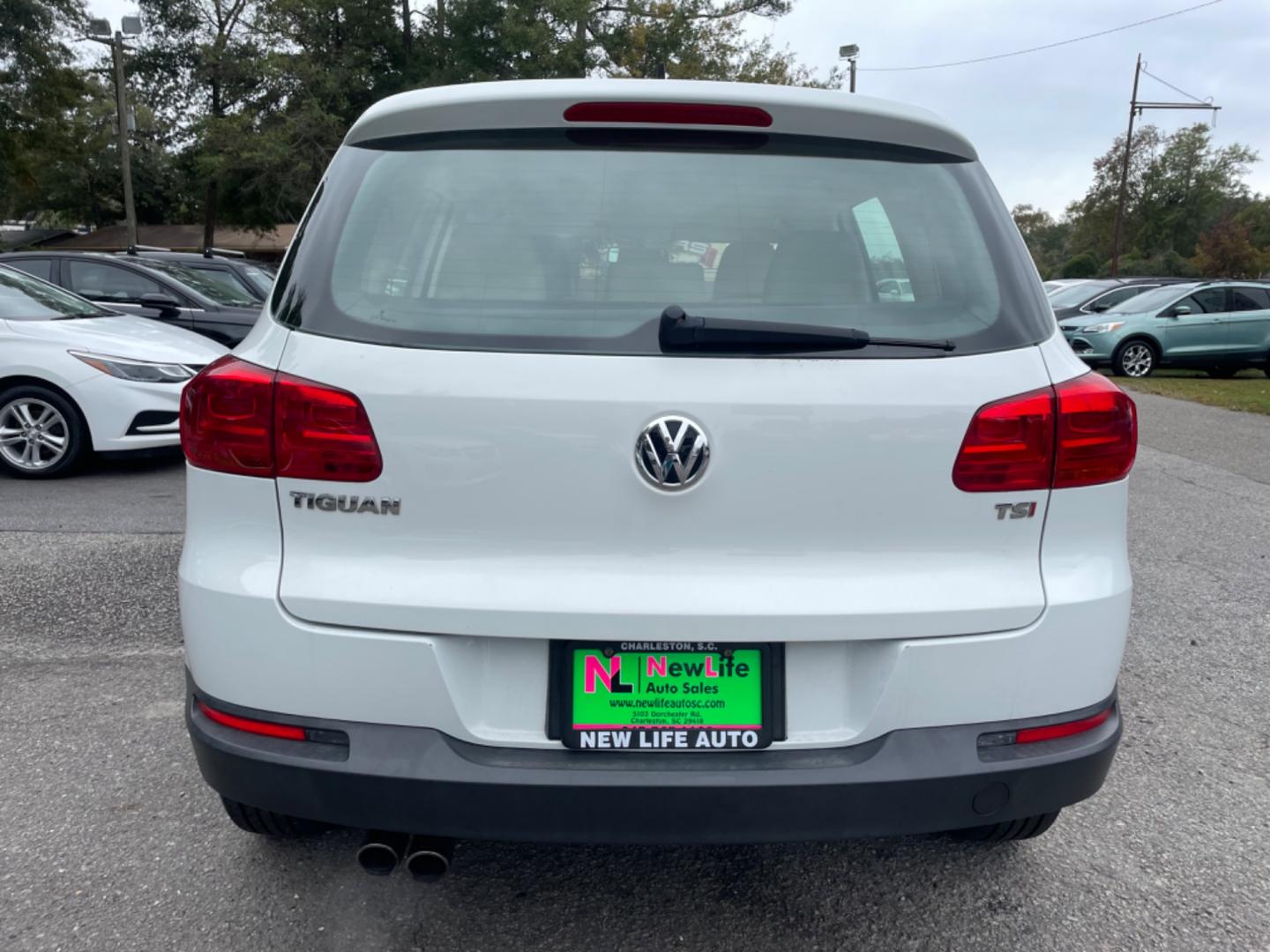 2017 WHITE VOLKSWAGEN TIGUAN S (WVGAV7AX7HK) with an 2.0L engine, Automatic transmission, located at 5103 Dorchester Rd., Charleston, SC, 29418-5607, (843) 767-1122, 36.245171, -115.228050 - Clean Interior with Leather, CD/AUX/USB/Bluetooth, Power Everything (windows, locks, seat, mirrors), Heated Seats, All-weather Mats, Push Button Start, Keyless Entry, Alloy Wheels. Clean CarFax (no accidents reported!) Local Trade-in!! 99k miles Located at New Life Auto Sales! 2023 WINNER for Pos - Photo#5